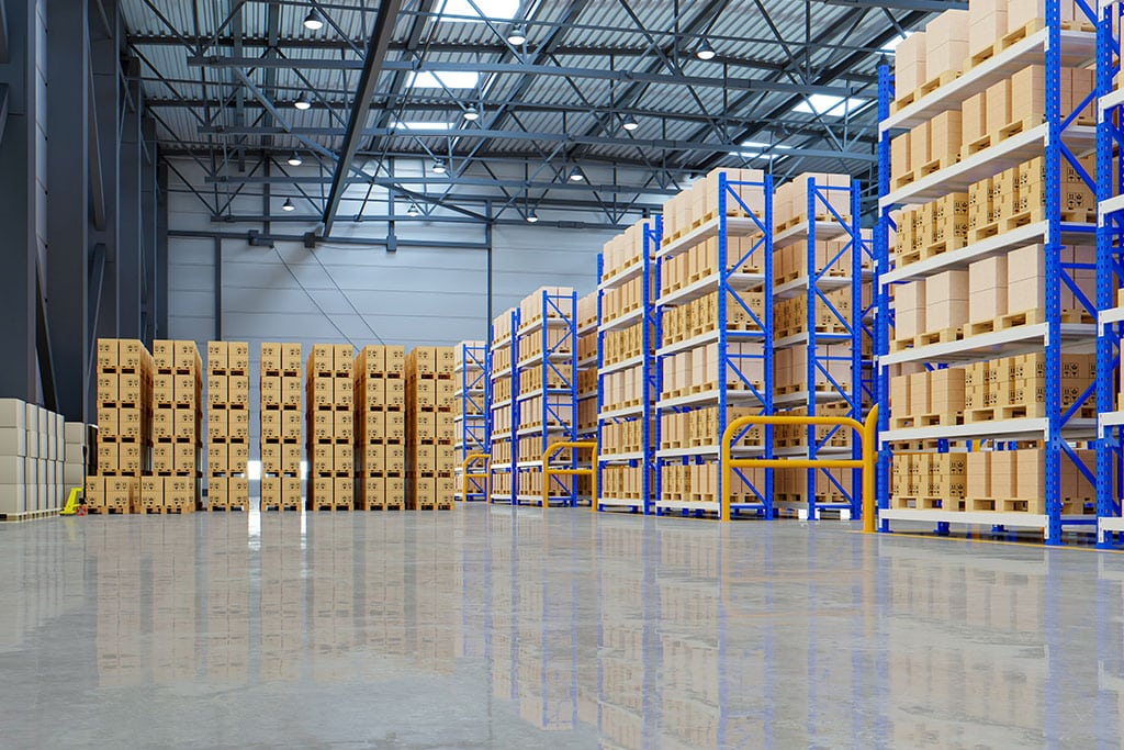 Pallets neatly stacked in Al Talib Shipping Company warehouse in Dubai
