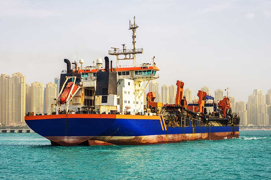 A cargo vessel outside Dubai port carrying cargo from Al Talib Shipping